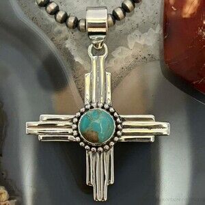 Sterling Silver Southwestern Style Round Mohave Turquoise Unisex Zia Pendant